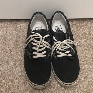 Women’s black Vans casual sneakers